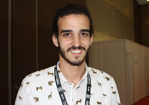 Young man in shirt smiling